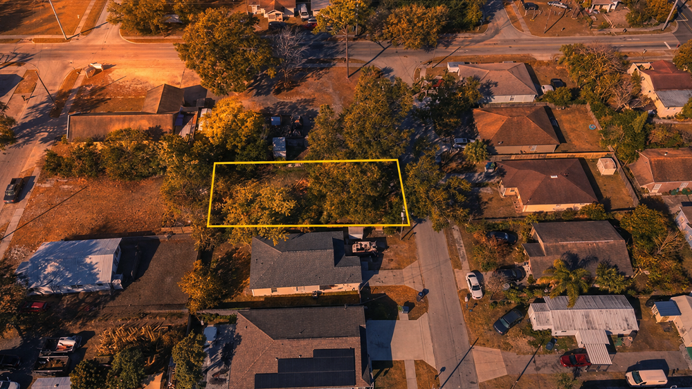Aerial view of vacant lot at 3405 E Powhatan Avenue in Tampa, Florida
